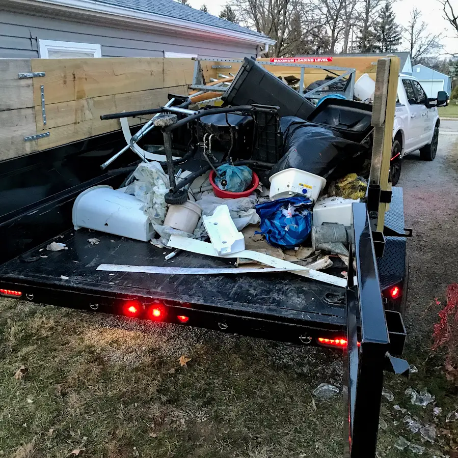 Roll-off dumpster delivered to a residential driveway in Edgewood